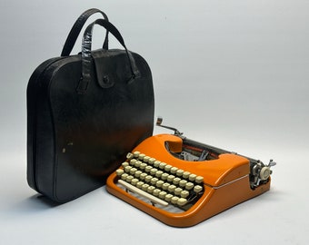 Vintage Orange Voss Typewriter – 1960s QWERTZ Keyboard, Black Bag
