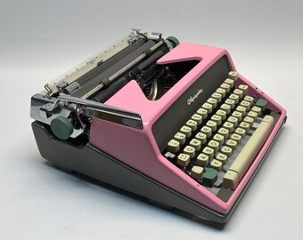 ピンクのオリンピア SM7 手動タイプライター - ビンテージ ポータブル