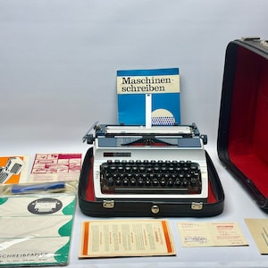 ¡Regalo elegante! Máquina de escribir antigua Erika negra / Elegancia vintage con teclado color crema / Máquina de escribir clásica coleccionable