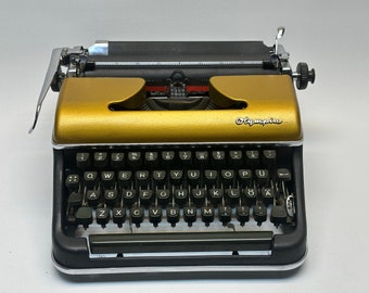 Olympia SM3 Gold Typewriter - Vintage Elegant Workspace Decor