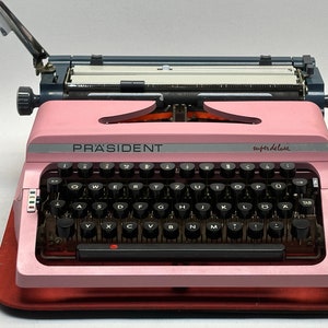 Máquina de escribir Parasident Pink - Teclado QWERTZ, teclas negras, bolsa de cuero, máquina de escribir manual antigua