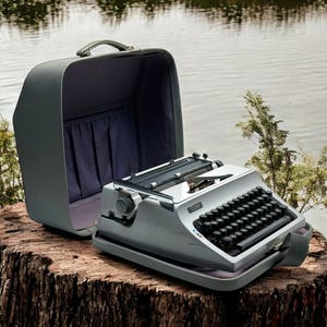 Vintage Erika Typewriter in Cool Ice Blue – Fully Functional, Perfect Gift for Writers & Collectors