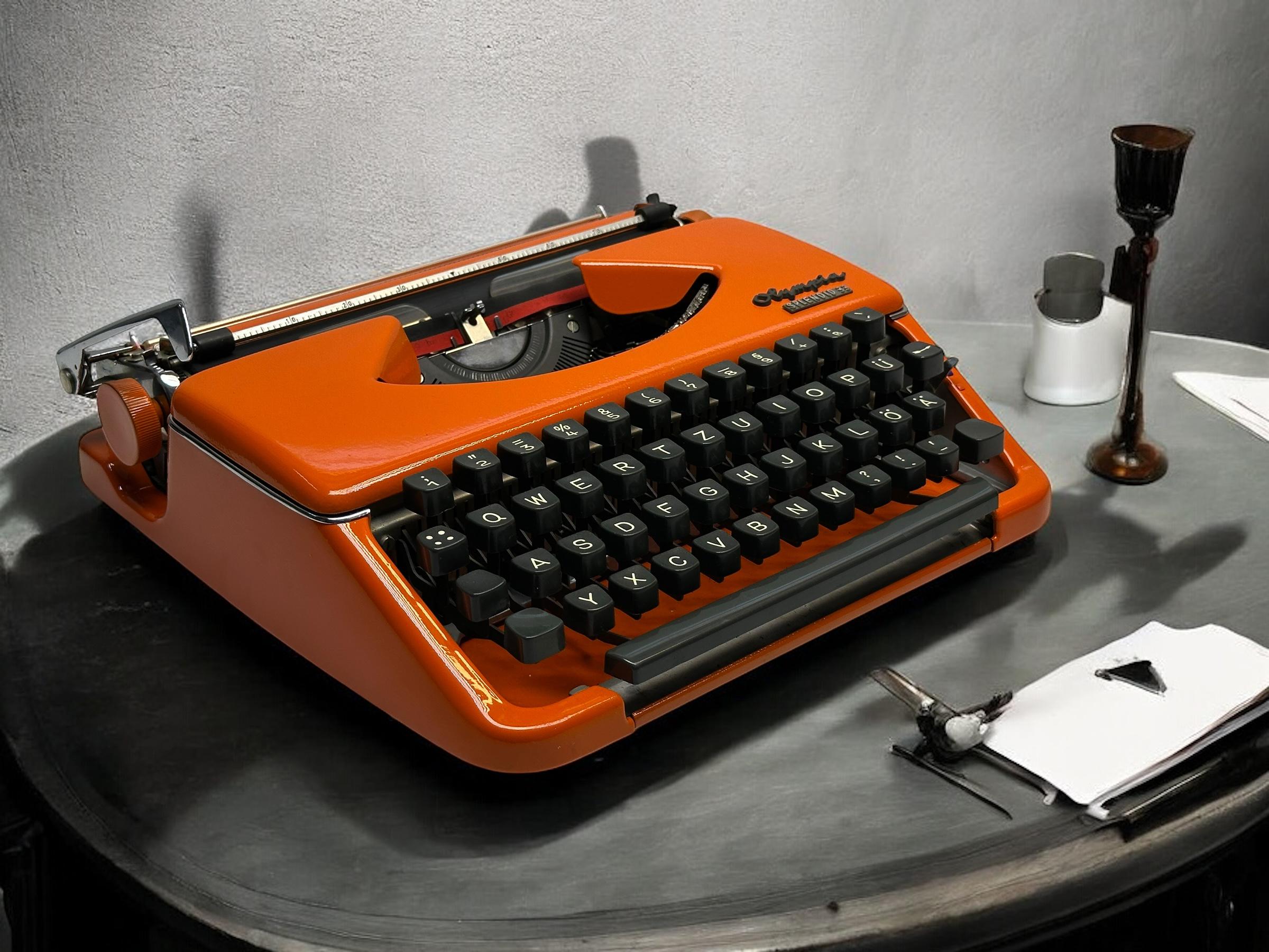 Vintage Orange Olympia Splendid 33 Typewriter – Retro Office Decor