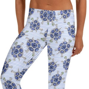 May include: Blue and white striped leggings with a pattern of jeweled turtles.