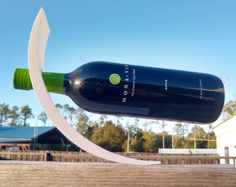 Expositor flotante curvo para botellas de vino