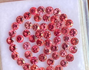 Lot of 54 Padparadscha Sapphires: 2.2-2.5 mm Round Cut, Bi-Color Gemstones