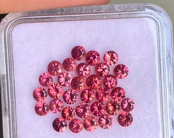 Lot of 31 Padparadscha Sapphires: 2.3-2.7 mm Round Cut, Bi-Color Gemstones