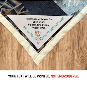 May include: A handmade item with a label that reads "Handmade with love for Sofia White by garndma Debbie Augest 2026." The item has a colorful patchwork design with a cream-colored border. The text "YOUR TEXT WILL BE PRINTED, NOT EMBROIDERED" is at the bottom.