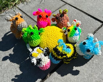 Loomigurumi koe regenboog weefgetouw