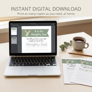 May include: A laptop displays a digital download with the text "A is for Almighty God." The image includes a cup of tea, a pencil, and printed worksheets with similar designs. The text "INSTANT DIGITAL DOWNLOAD" is at the top.