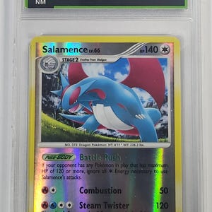 May include: A Salamence Pokemon card from the 2008 D&P-Stromfront set. The card is a reverse holofoil and features a blue and red Salamence with a white background. The card is in near mint condition and has a degree 7 rating.