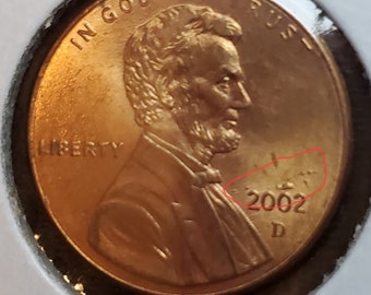 Circulated 2002 Die Chip/Zinc Plating Bubble