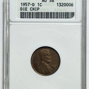 1957-D Lincoln Wheat Cent – ANACS AU58 – Die Chip Error in “B” of LIBERTY – Denver Mint – Certified U.S. Error Penny