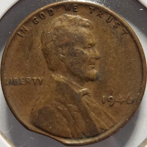 1946 P Lincoln Wheat Penny – Curved Clip Error – Rare Mint Error Coin – Fine Condition