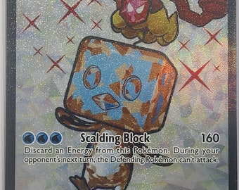 May include: A Pokemon trading card featuring Eiscue ex, a blue and brown ice-type Pokemon with a Tera symbol. The card has a white background with red and white X's. The card text reads "As long as this Pokemon is on your Bench, prevent all damage done to this Pokemon by attacks (both yours and your opponent's)." The card also has a move called "Scalding Block" that does 160 damage and has the effect "Discard an Energy from this Pokemon. During your opponent's next turn, the Defending Pokemon can't attack."