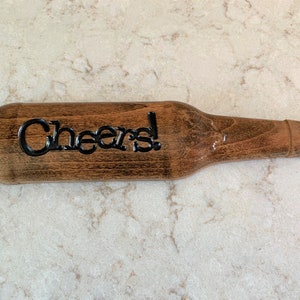 Novelty Bottle Opener - Shaped as a Beer Bottle - Solid Wood - With Magnet