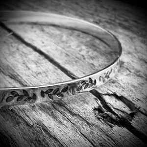 Solid silver bangle bracelet, leaf pattern, hand stamped
