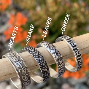 High quality real .925 sterling silver stacking rings showing different styles available. Stacking ring set, stackers, stackable, cute, dainty. Greek key, hearts, snake, leaves.