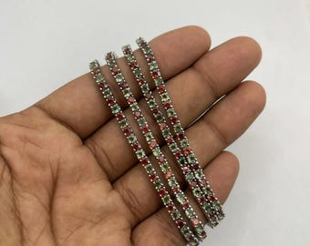 Bransoletka z granatem mołdawickim: Bransoletka tenisowa ze srebra próby 925, czeski kamień szlachetny