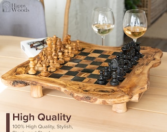 May include: A wooden chessboard with black and white squares, made from olive wood. The board has a natural, rustic look and is set on a wooden table. The chess pieces are made of wood and are arranged on the board in a starting position. The board has a natural, rustic look and is set on a wooden table. The chess pieces are made of wood and are arranged on the board in a starting position. The board has a natural, rustic look and is set on a wooden table. The chess pieces are made of wood and are arranged on the board in a starting position.