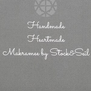 May include: A grey background with white text that reads "Handmade Heartmade Macramee by Stock & Seil". A stylised circle with a cross inside is above the text.