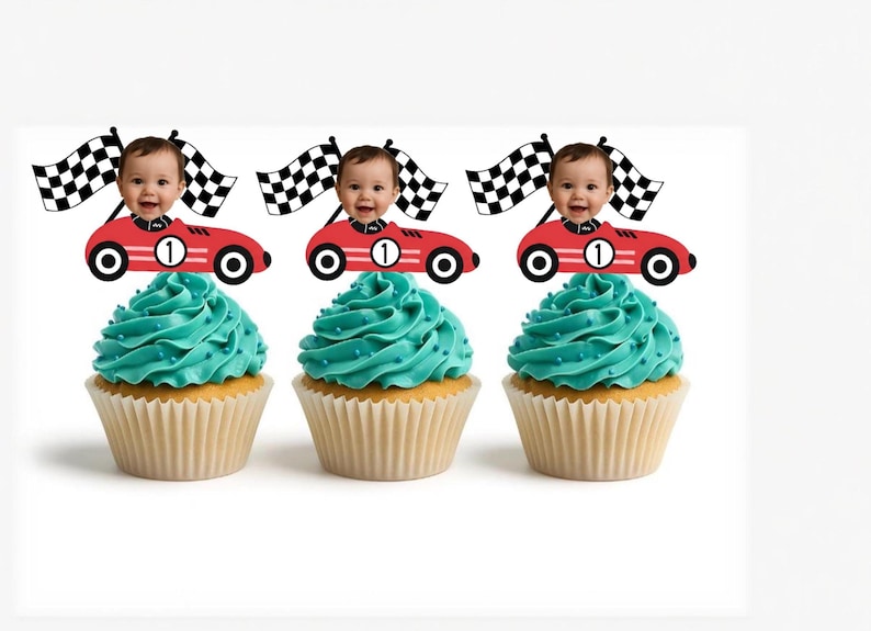 May include: Three cupcakes with teal frosting and racing car toppers. Each cupcake has a red race car with a baby's face and a checkered flag. The race cars have the number 1 on them.