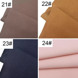 May include: Four fabric swatches in different colors and textures. The swatches are labeled with numbers 21, 22, 23, and 24.