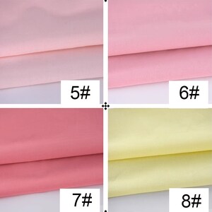 May include: Four fabric swatches in different colors. The top left swatch is a light pink, the top right swatch is a darker pink, the bottom left swatch is a coral pink, and the bottom right swatch is a pale yellow. Each swatch is labeled with a number: 5#, 6#, 7#, and 8#.