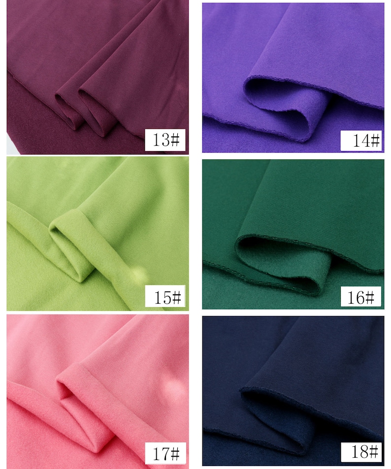 May include: Six fabric swatches in different colors: burgundy, purple, green, dark green, pink, and navy blue. Each swatch is folded in half and labeled with a number.