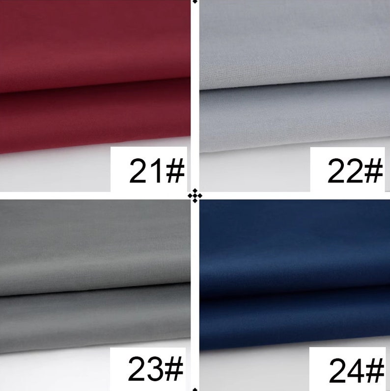 May include: Four fabric swatches, each folded in half. The swatches are labeled 21#, 22#, 23#, and 24#. The swatches are burgundy, light gray, dark gray, and navy blue.