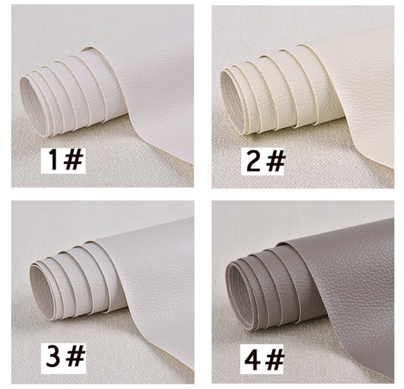 May include: Four rolls of faux leather fabric in different colors. The first roll is white, the second is off-white, the third is light gray, and the fourth is gray. Each roll is labeled with a number from 1 to 4.
