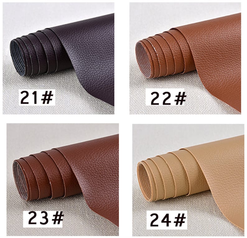 May include: Four rolls of faux leather fabric in different colors: dark purple, brown, dark brown, and beige. The rolls are labeled with numbers 21, 22, 23, and 24.