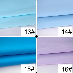 May include: Four fabric swatches, each folded in half. The swatches are light blue, a darker shade of blue, lavender, and a lighter shade of lavender. The swatches are labeled with numbers 13, 14, 15, and 16.