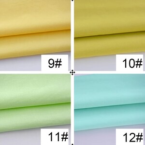 May include: Four fabric swatches, two yellow and two green. The swatches are folded in half and labeled with numbers 9, 10, 11, and 12.