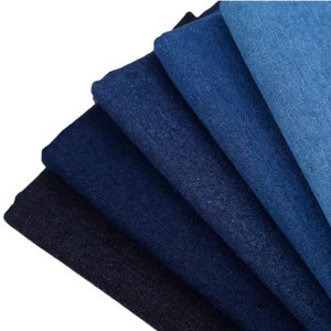 Schwerer blauer Denim-Stoff, gewaschener Denim-Stoff, Baumwoll-Denim-Jeansstoff, Bekleidungsstoff, Nähen von schwerem Denim, um den halben Meter