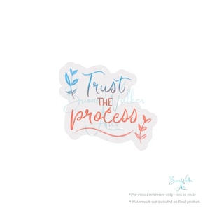 May include: A sticker with a white background and blue and pink lettering that says "Trust the Process". The sticker has a floral design on the left and right sides.