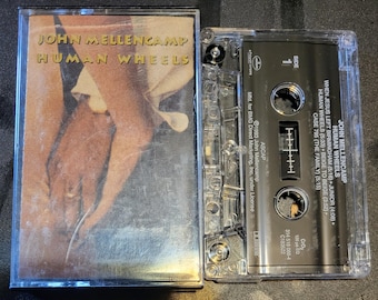 Casete de la canción "Human Wheels" de John Mellencamp