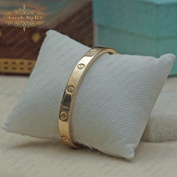 Solid gold shop cuff bangle