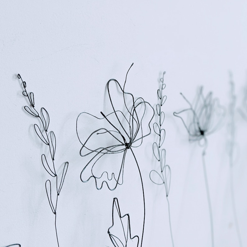 Detailed wire flowers, made from different diameter wires. Each one is an unique and can be a perfect gift.