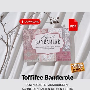 以下が含まれることがあります： 装飾的なフォントで「HAYIRLI BAYRAMLAR」という言葉が書かれたグリーティングカード。ピンクと白の模様のデザインです。Toffifeeキャンディーの小さな箱がカードの隣にあります。画像には「ダウンロード」ボタンと「PDF」アイコンも含まれています。