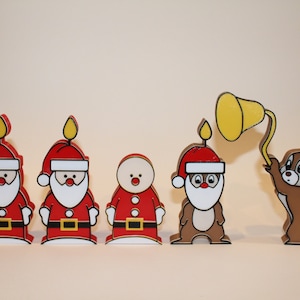 May include: Five Christmas-themed figurines, including three Santa Clauses, one snowman, and one Chipmunk. The Santa Clauses are wearing red suits with white trim and have white beards. The snowman is wearing a red hat and scarf. The Chipmunk is holding a yellow bell.