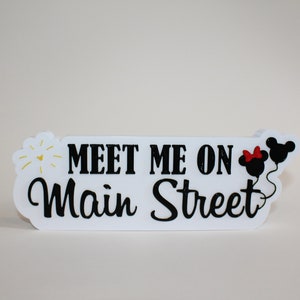 Meet Me On Main Street Sign