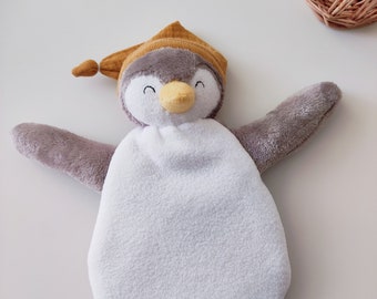 Flat cuddly toy penguin in fleece and soft taupe fabric for mixed boys and girls with personalized embroidery of the baby&#39;s first name