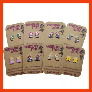 Cartoons style stud Earrings. Sizes: Approx 10/15mm Studs or 20/25mm Dangles.