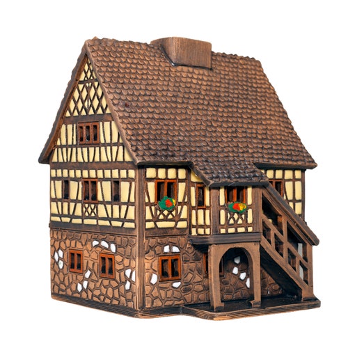 Alsatian style ceramic candle shops house with stairs