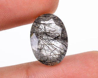 Piedra ovalada de cuarzo rutilado negro de 6 quilates, 14 x 10 x 6 mm.