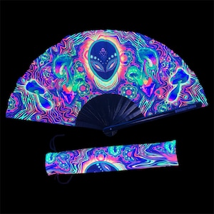 Abduction UV-reaktiv fläkt med matchande väska Alien – Perfekt tillbehör till musikfestivalen