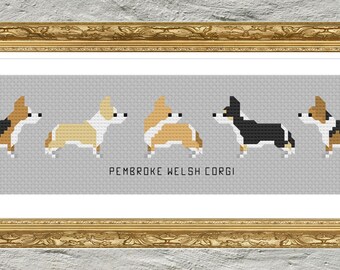 Może przedstawiać: Ramka z haftem krzyżykowym przedstawiająca cztery psy rasy Pembroke Welsh Corgi w różnych kolorach i pozach. Pod psami znajduje się napis "PEMBROKE WELSH CORGI".