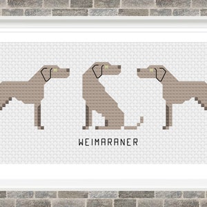 May include: Cross-stitch pattern featuring three Weimaraner dogs in different poses. The dogs are brown and white, and the pattern includes the word "Weimaraner".