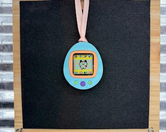 Retro Virtual Pet Christmas Ornament, 90s Nostalgia Holiday Decor, Gamer Gift, Tamagotchi Inspired Ornament